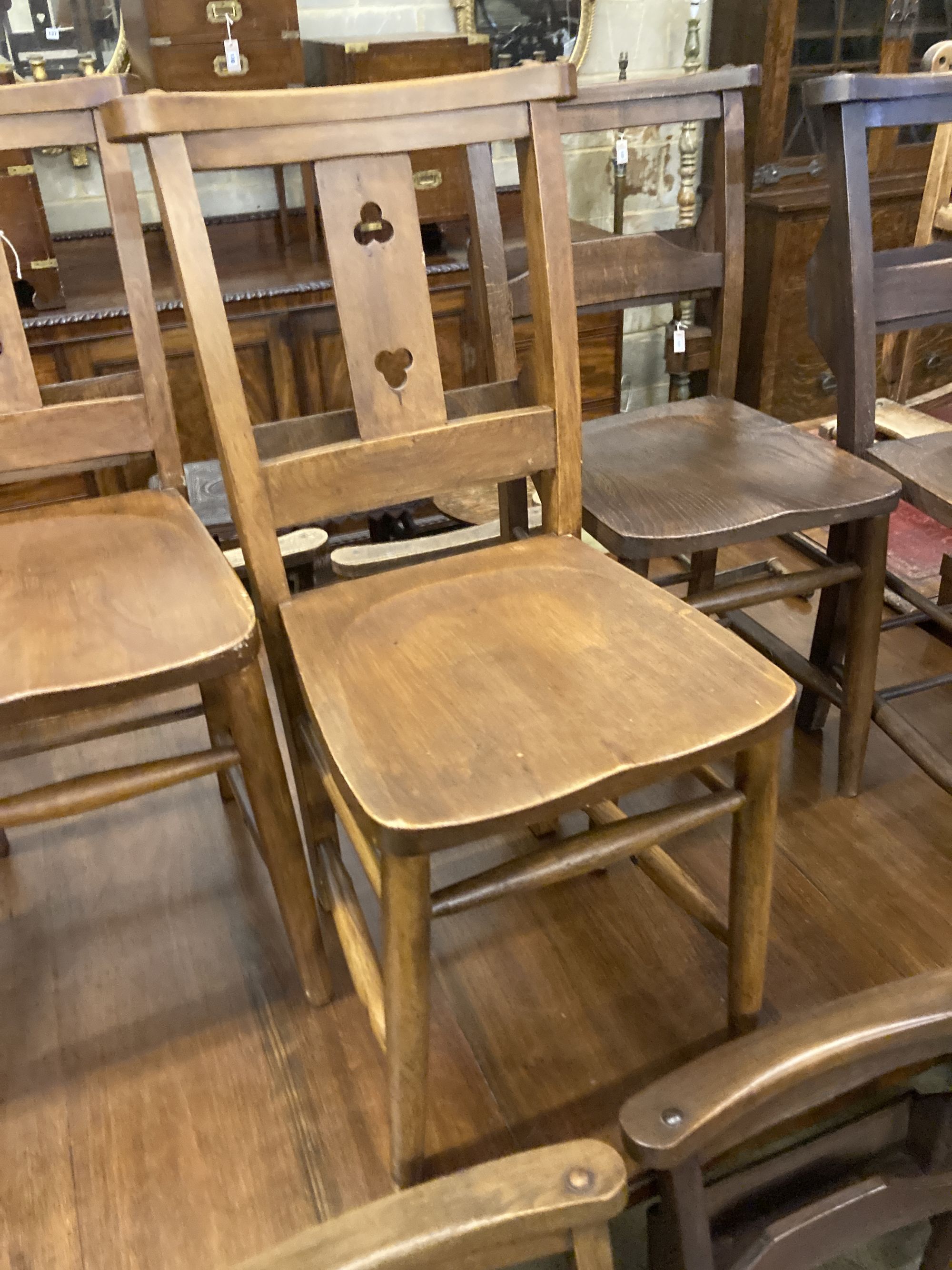 Seven Victorian elm and beech chapel chairs